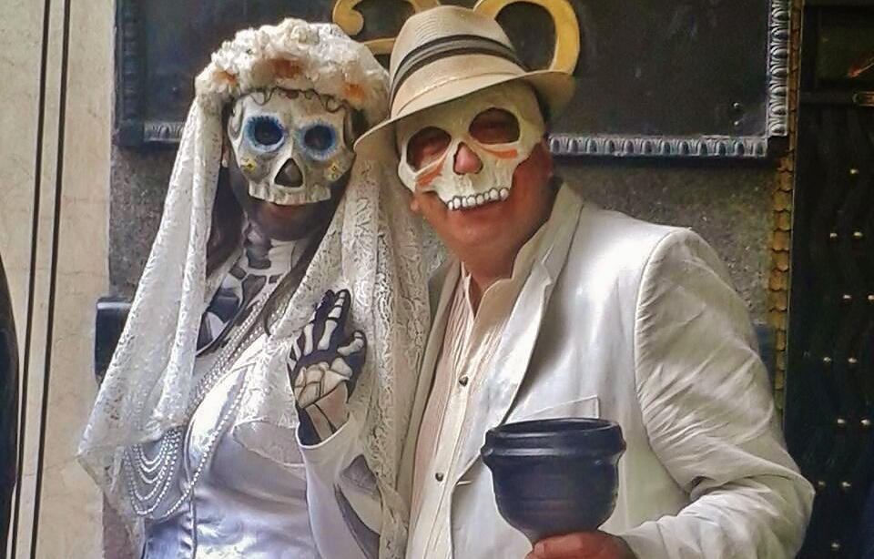 mexican couple celebrating dia de los muertos: day of the deads